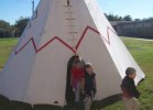 Children getting an idea of how Lipan Apache lived.